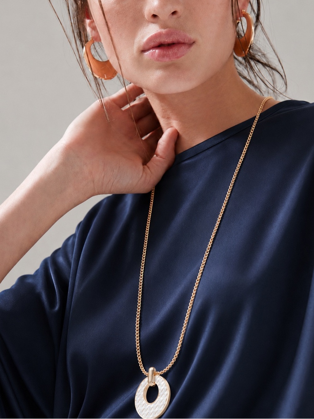WHBM Gold Tone 34" Long Chain Necklace and White Leather Pendant